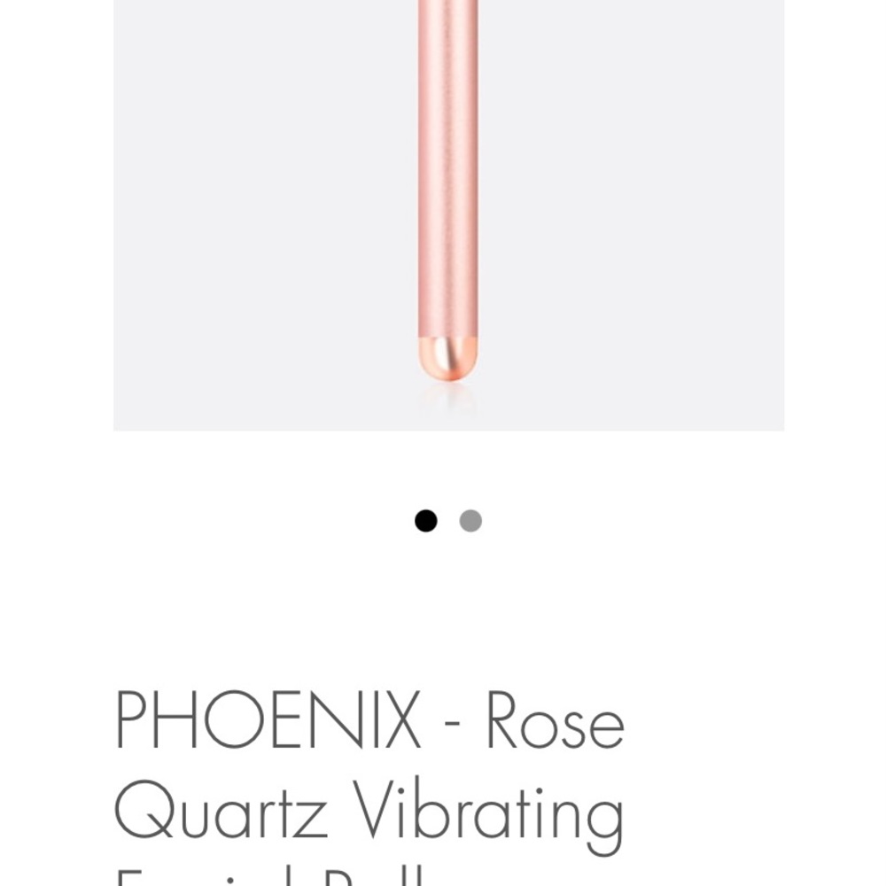 Rose quartz vibrating facial massager